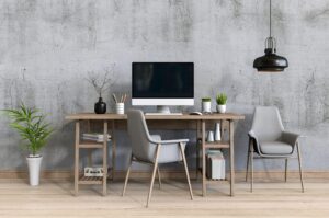 Modern office featuring a computer desk and ergonomic chairs.