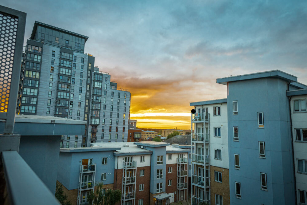 Sunset view from a balcony, with vibrant colours in the sky.