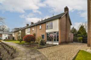 Semi-detached houses with gardens in a quiet Bishopsworth residential street in Bristol