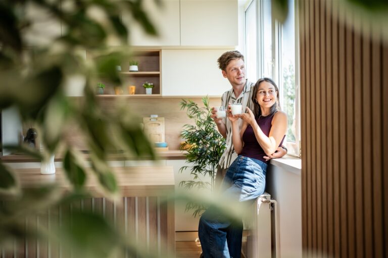 Couple enjoying a bright kitchen in a Long Ashton home